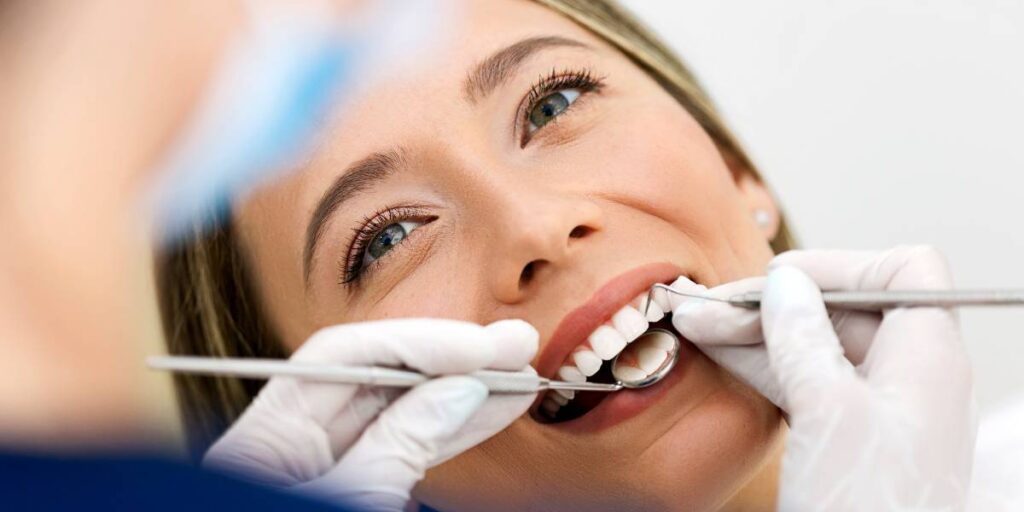 Smile with OC Dental Implant Center
